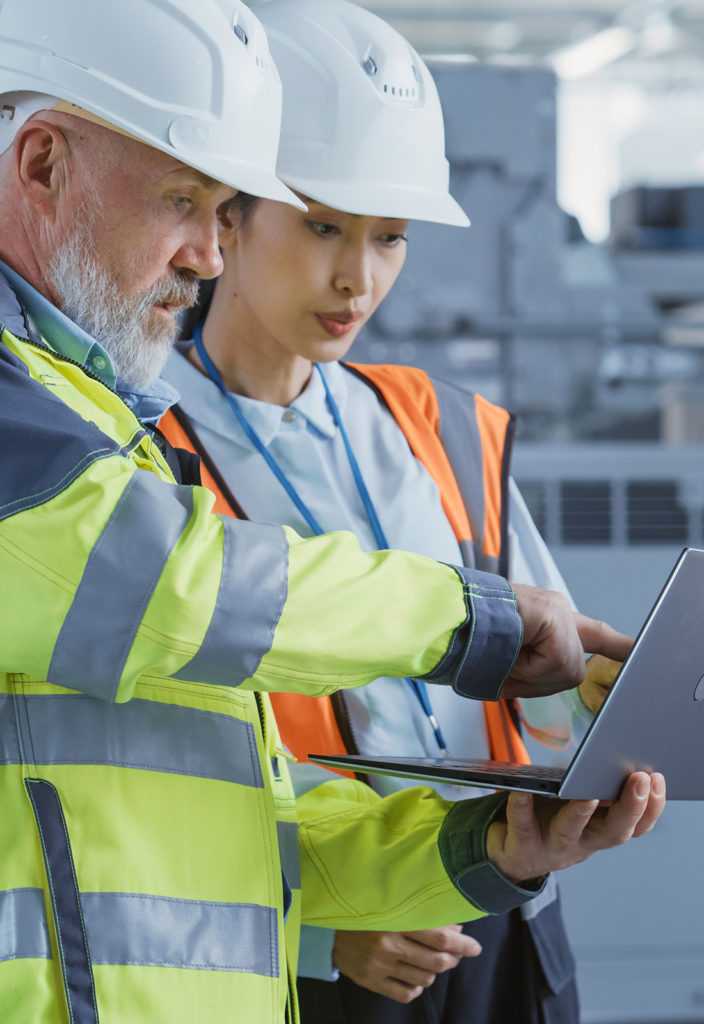 Manufacturing Managers Collaborating