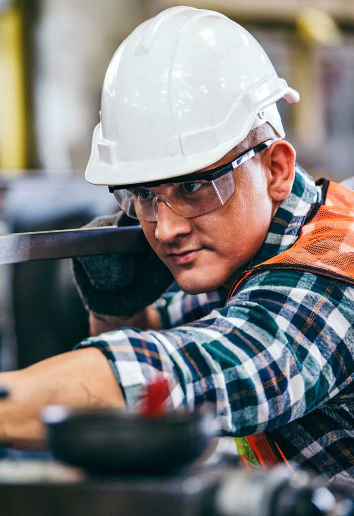 Technician worker in safety hard helmet
