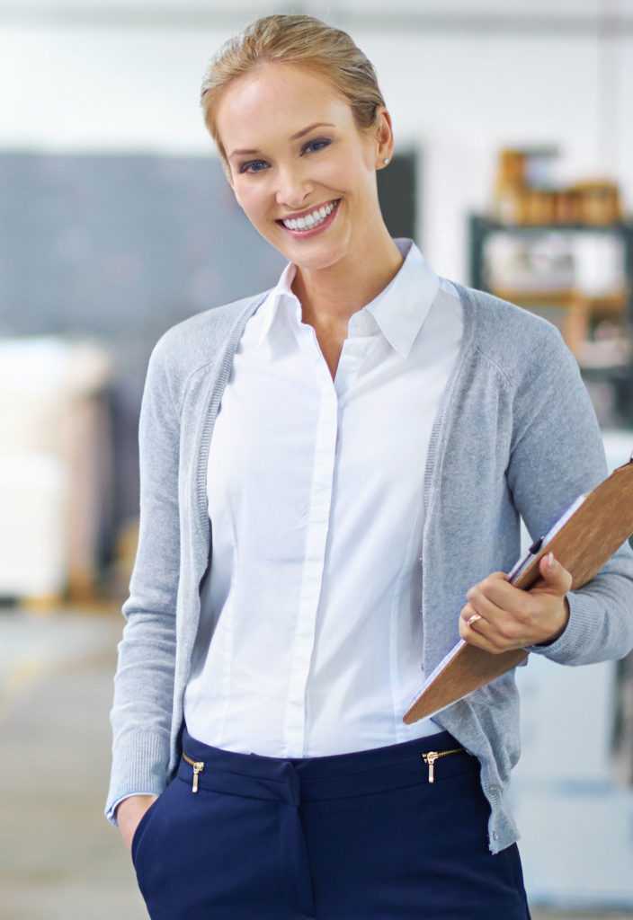 manager looking confident while on the factory floor